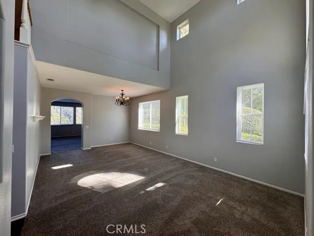 a view of hallway with wooden floor