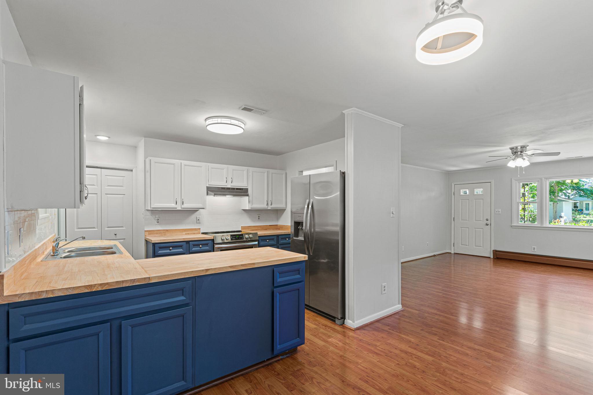 18352 River Road Tall Timbers, MD 20690 - Photo 15 of 29 Kitchen to Living Room