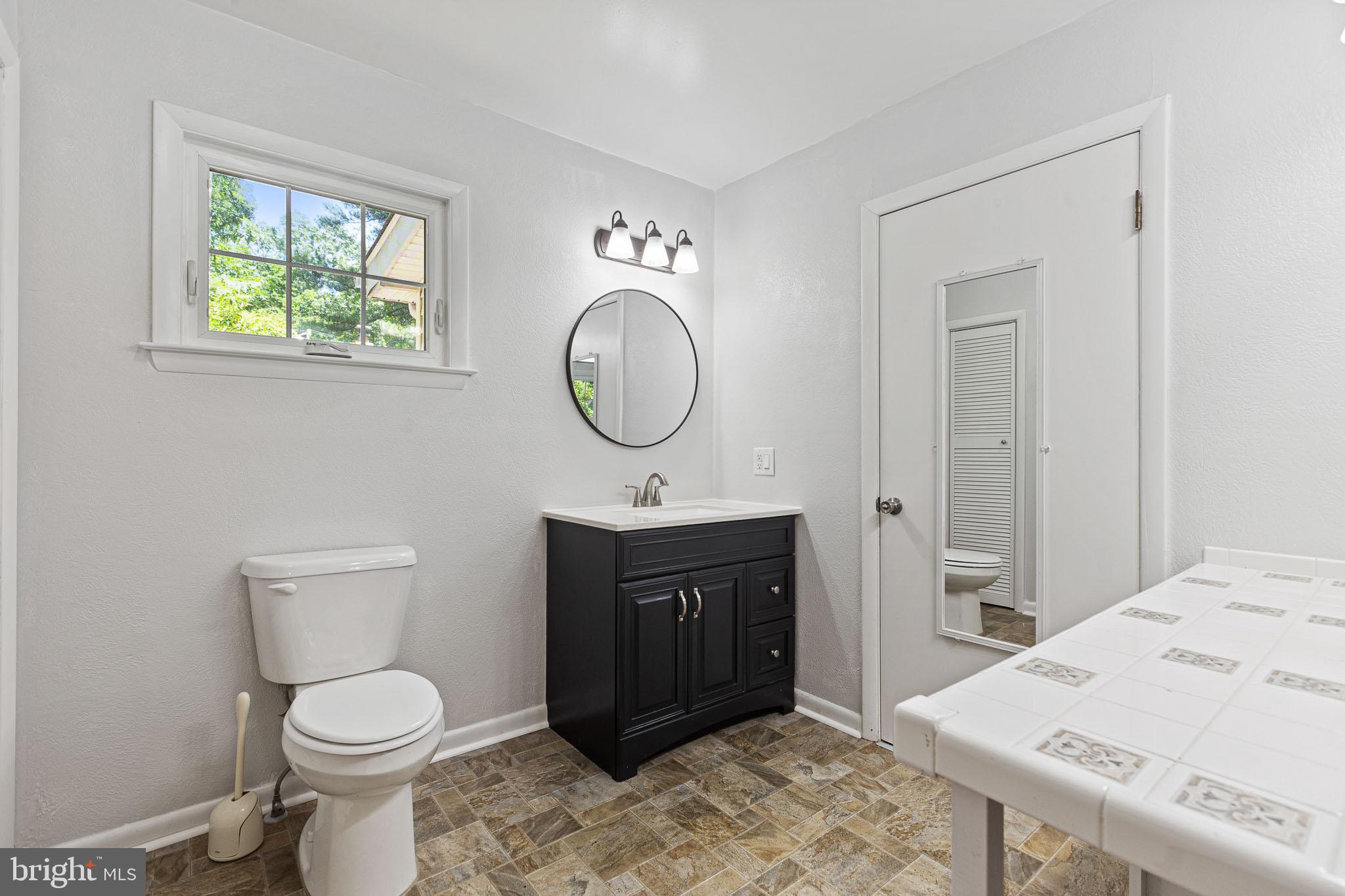 18352 River Road Tall Timbers, MD 20690 - Photo 7 of 29 Full Bath with Walk-in Shower off Rec Room