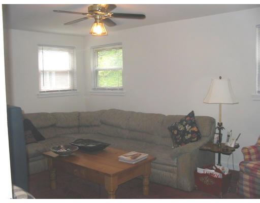 36 Longwell Road Newton, MA 02462 - Photo 5 of 8 a living room with furniture and a window