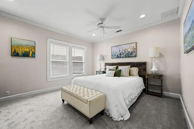 a bathroom with a granite countertop sink a mirror and shower