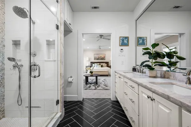 a bathroom with a shower and a toilet