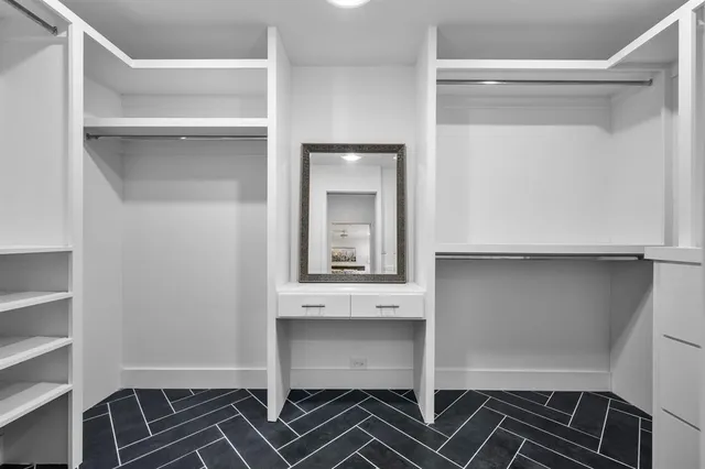 a view of an empty walk in closet