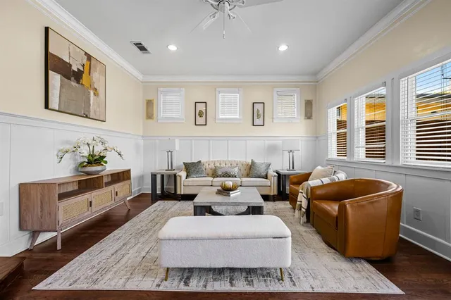 a view of a living room and entryway
