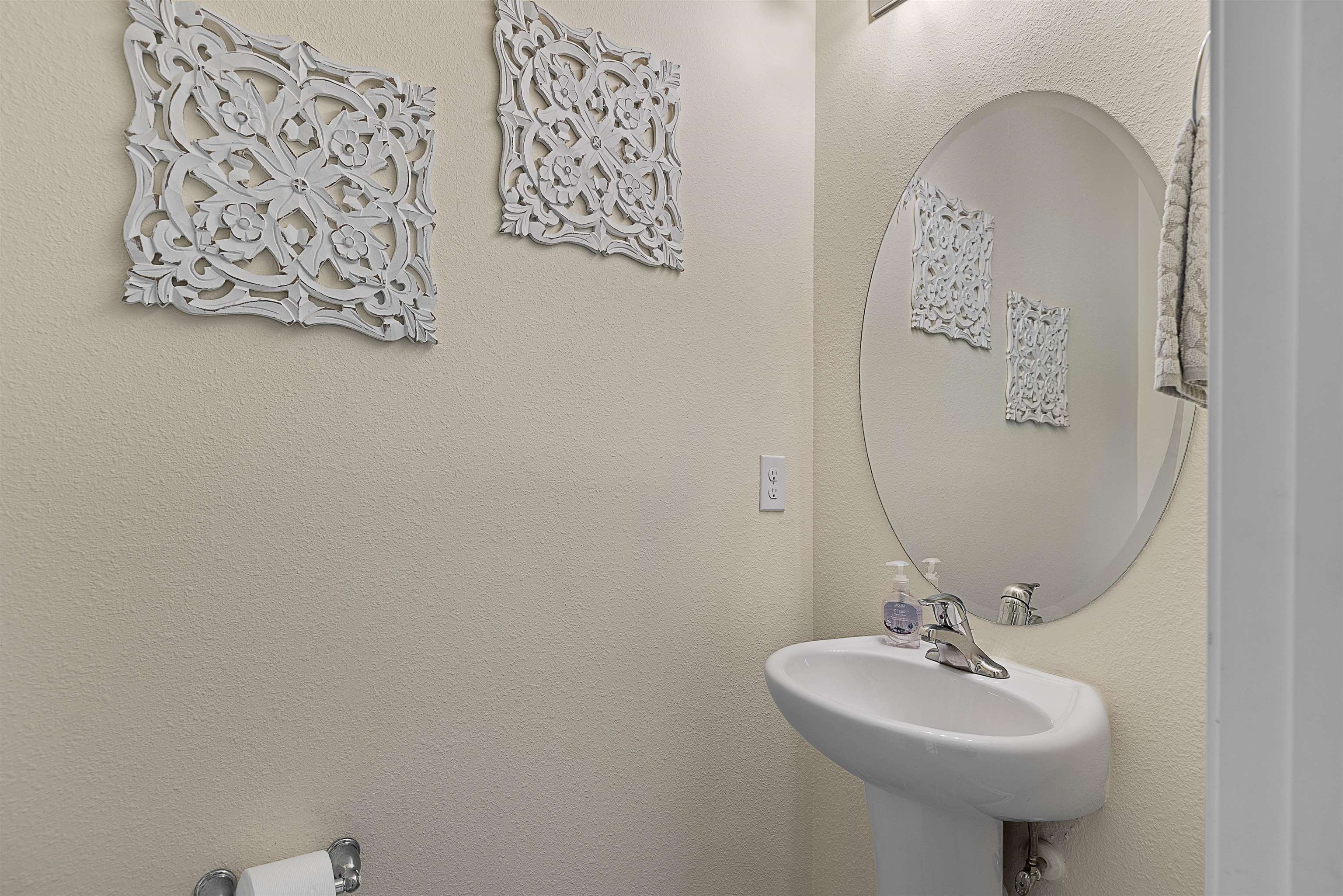 877 Rotary Road Jacksonville, FL 32211 - Photo 16 of 36 a bathroom with a sink and mirror