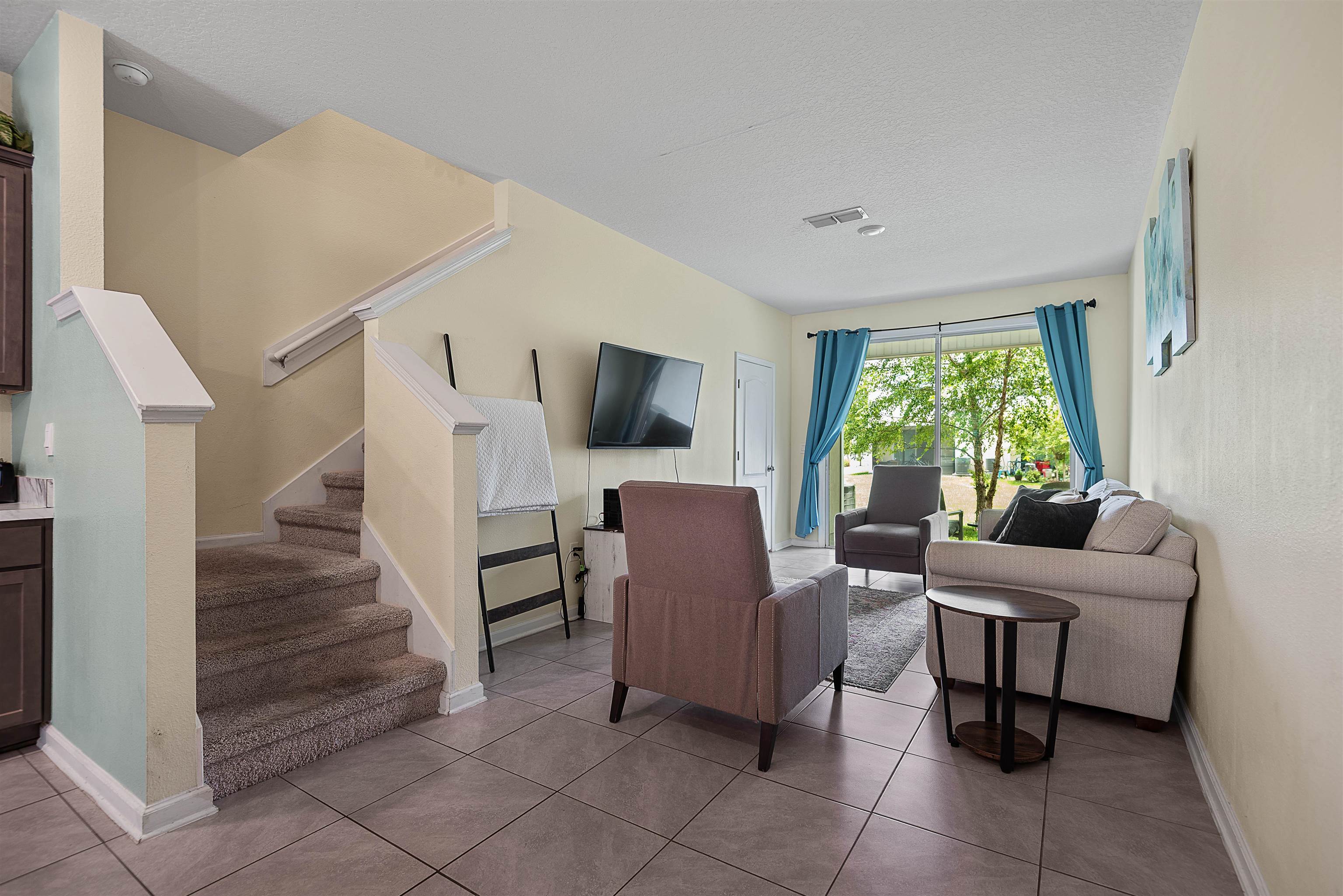 877 Rotary Road Jacksonville, FL 32211 - Photo 2 of 36 a living room with furniture and a large window