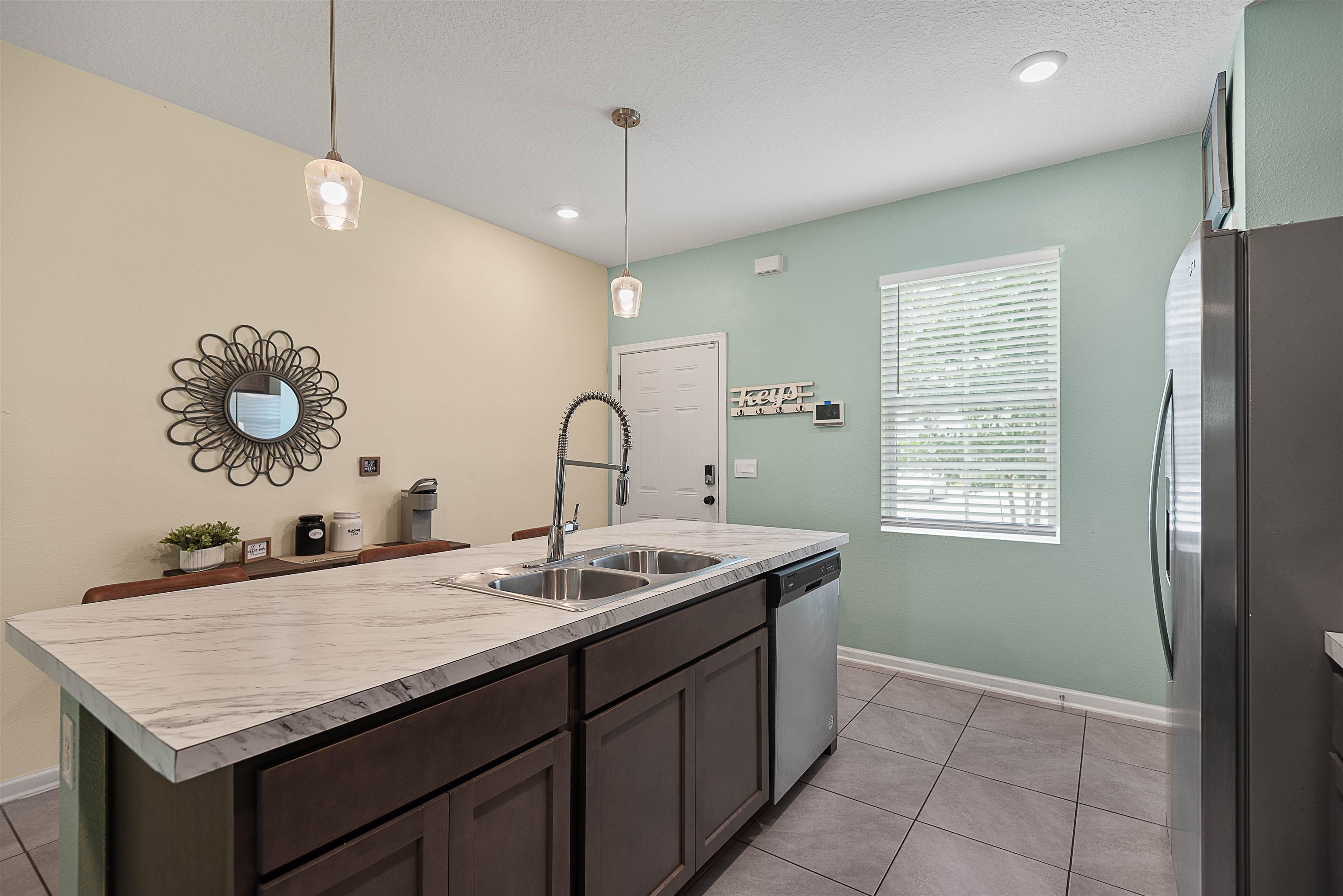 877 Rotary Road Jacksonville, FL 32211 - Photo 26 of 36 a kitchen with sink and window