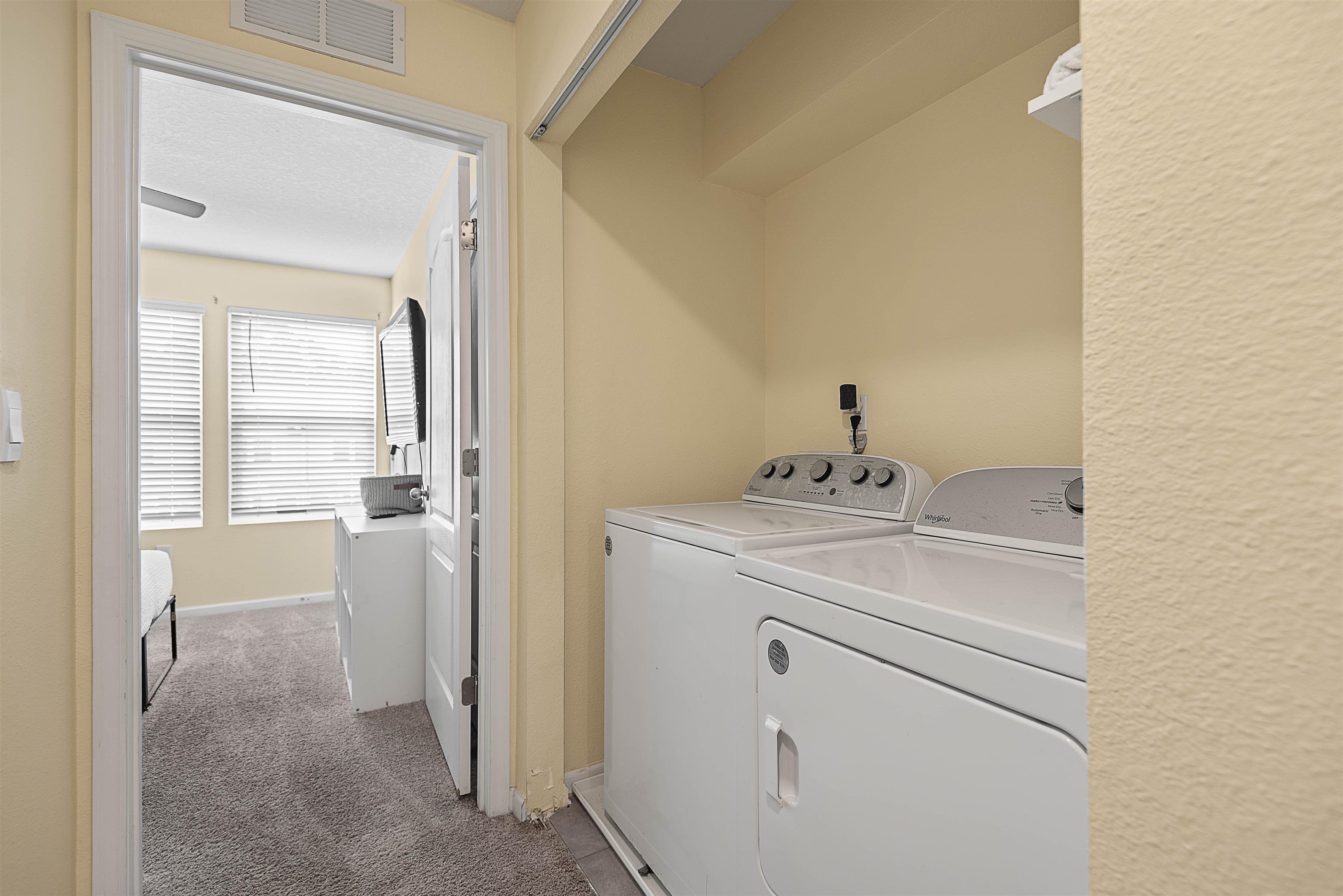 877 Rotary Road Jacksonville, FL 32211 - Photo 27 of 36 a en suite bathroom with a sink and a mirror