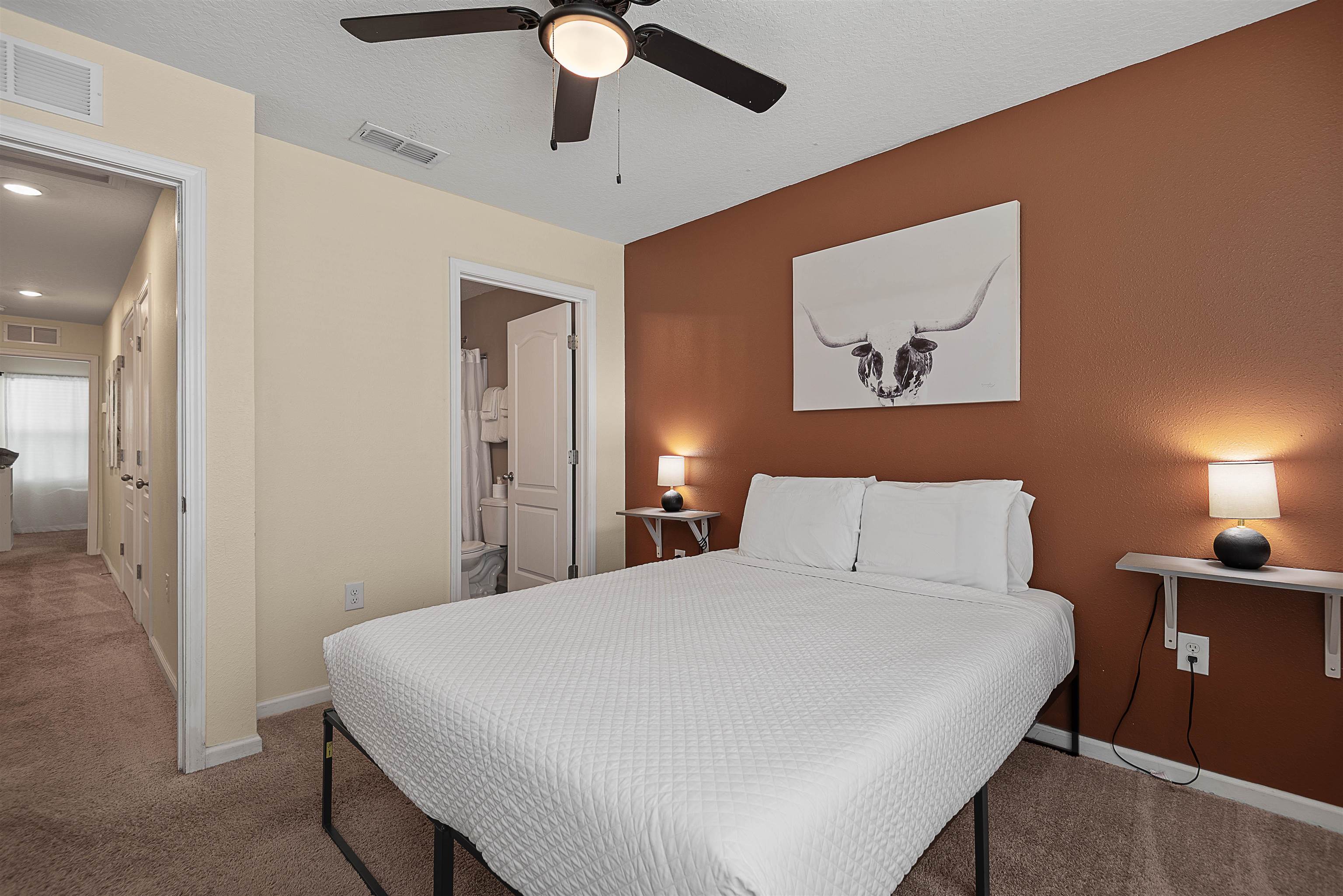 877 Rotary Road Jacksonville, FL 32211 - Photo 28 of 36 a bed room with a bed and a painting on the wall