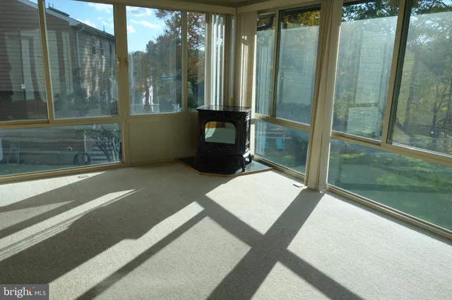 a picture of a glass door and the floor to ceiling window