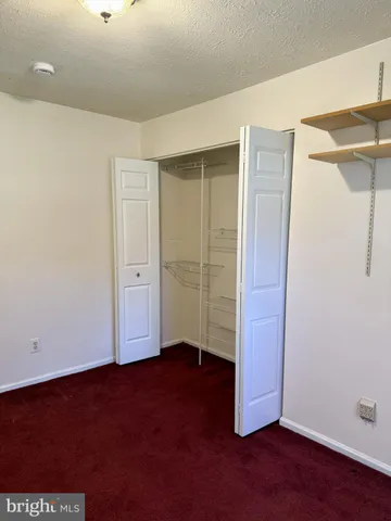 an empty room with closet