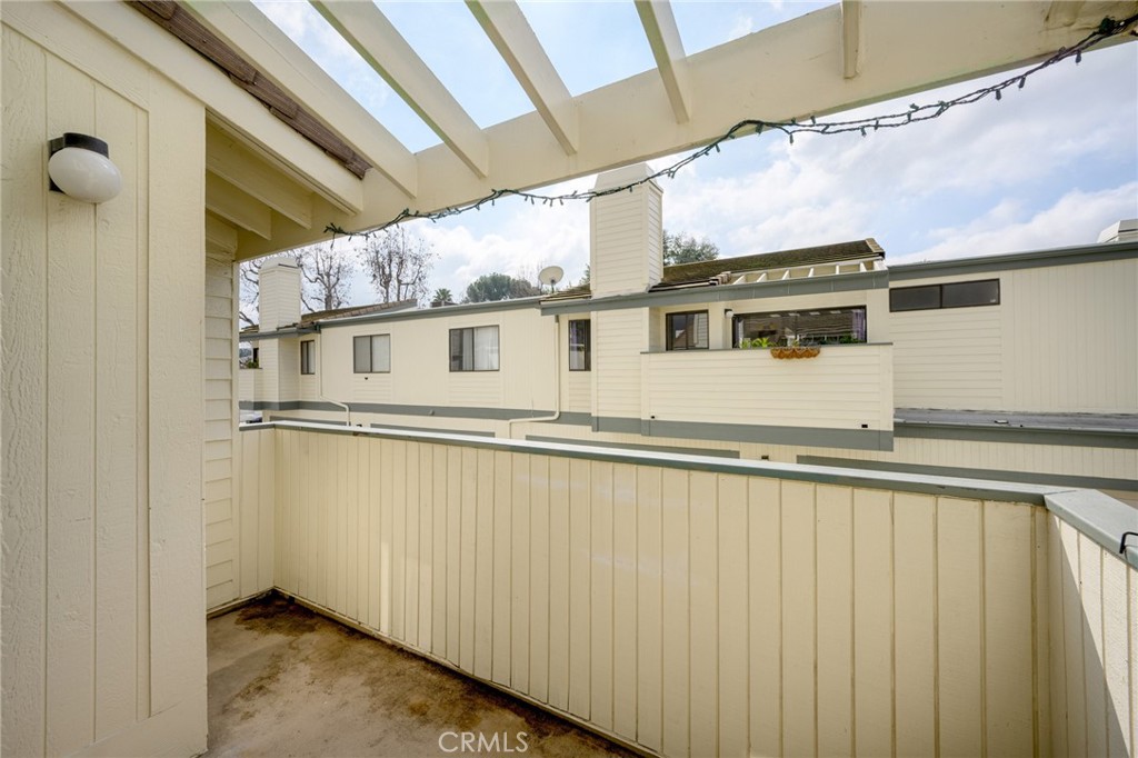 10475 Newhome Avenue, Unit 6 Sunland, CA 91040 - Photo 13 of 28 a view of a house with a balcony