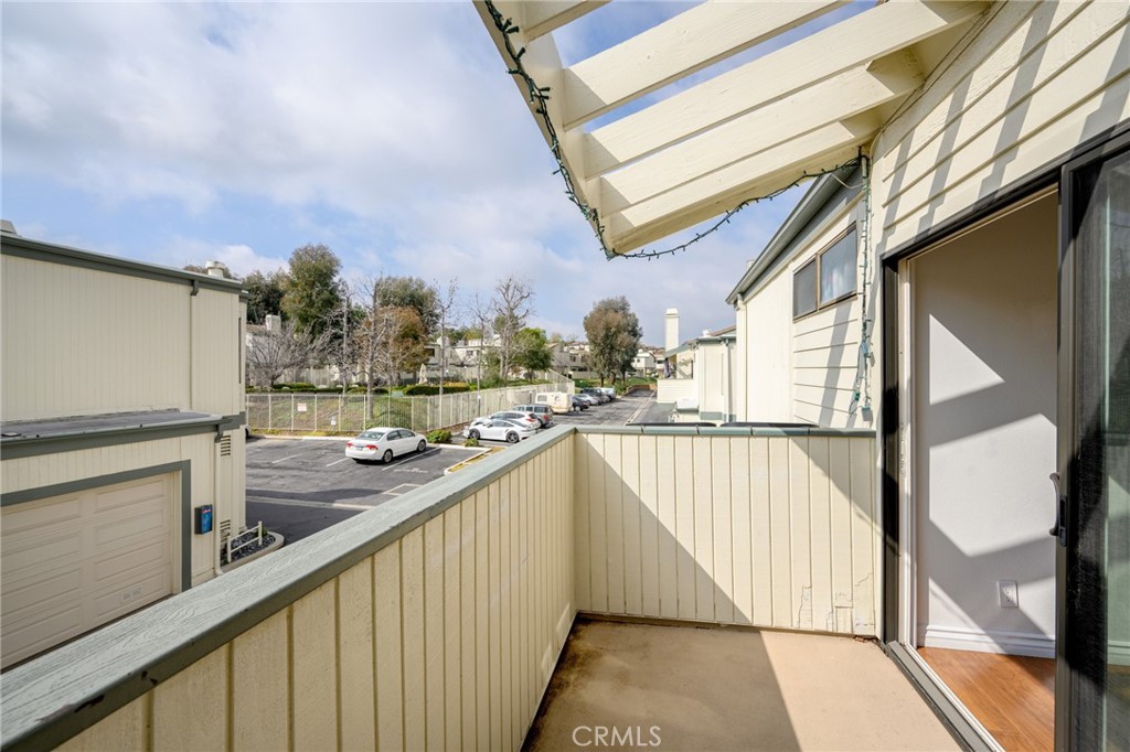 10475 Newhome Avenue, Unit 6 Sunland, CA 91040 - Photo 14 of 28 a view of balcony with two windows and potted plants