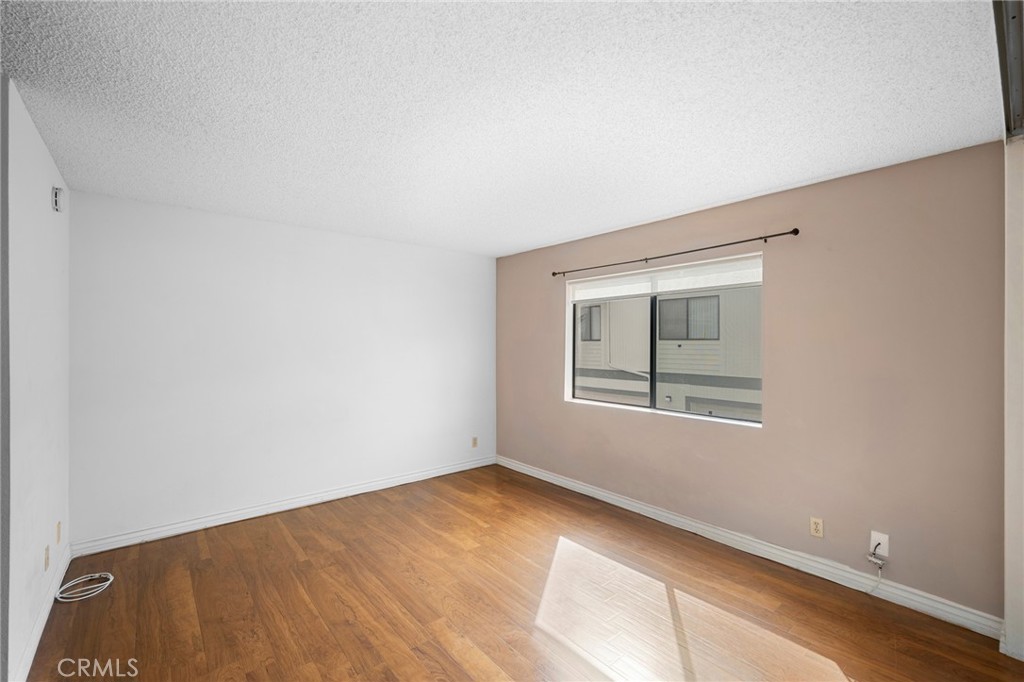 10475 Newhome Avenue, Unit 6 Sunland, CA 91040 - Photo 18 of 28 a view of an empty room with a window