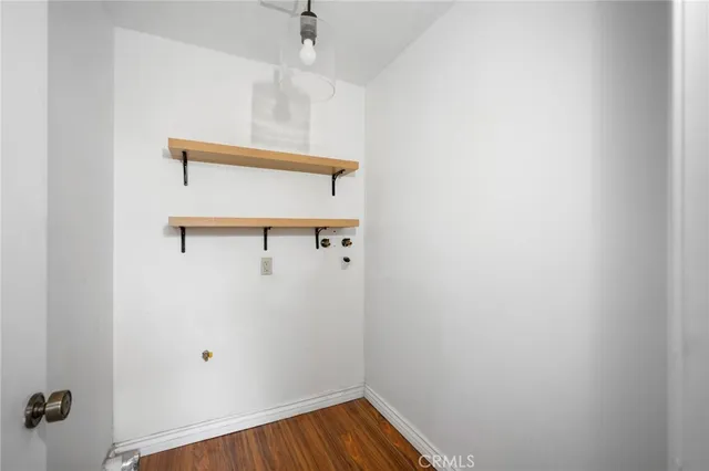 a view of a hallway with closet