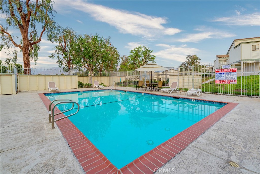10475 Newhome Avenue, Unit 6 Sunland, CA 91040 - Photo 27 of 28 swimming pool view with a garden space