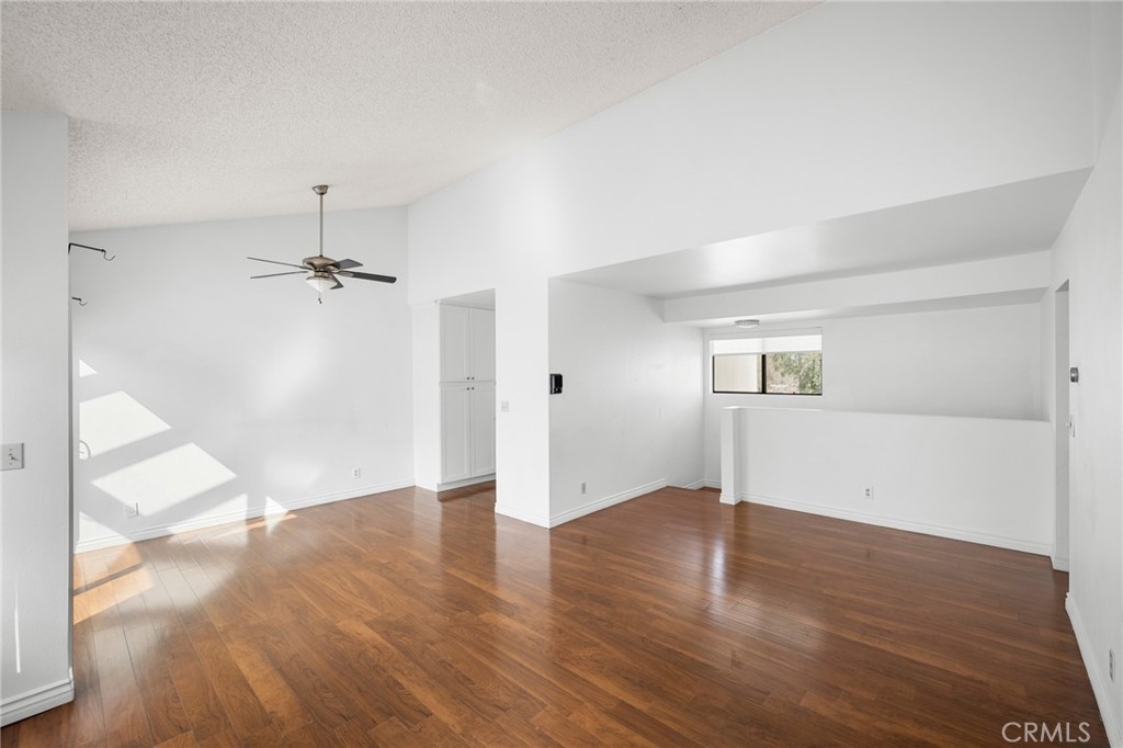 10475 Newhome Avenue, Unit 6 Sunland, CA 91040 - Photo 9 of 28 wooden floor in an empty room with a window