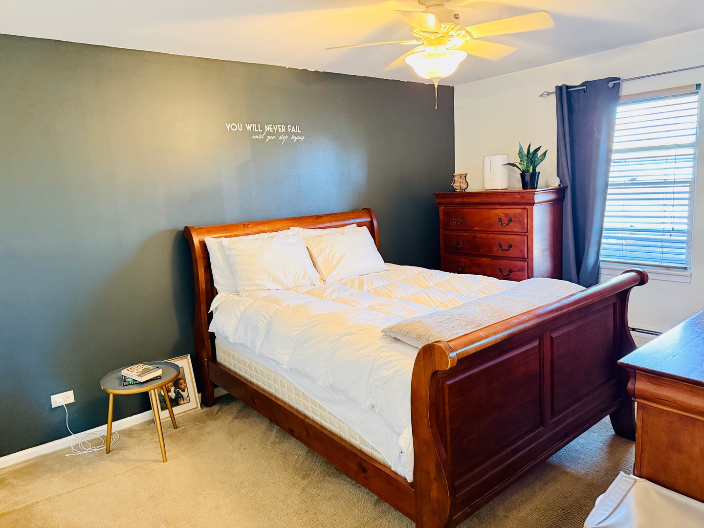 3823 West 123rd Street, Unit 302 Alsip, IL 60803 - Photo 15 of 35 a bedroom with a bed and a chandelier