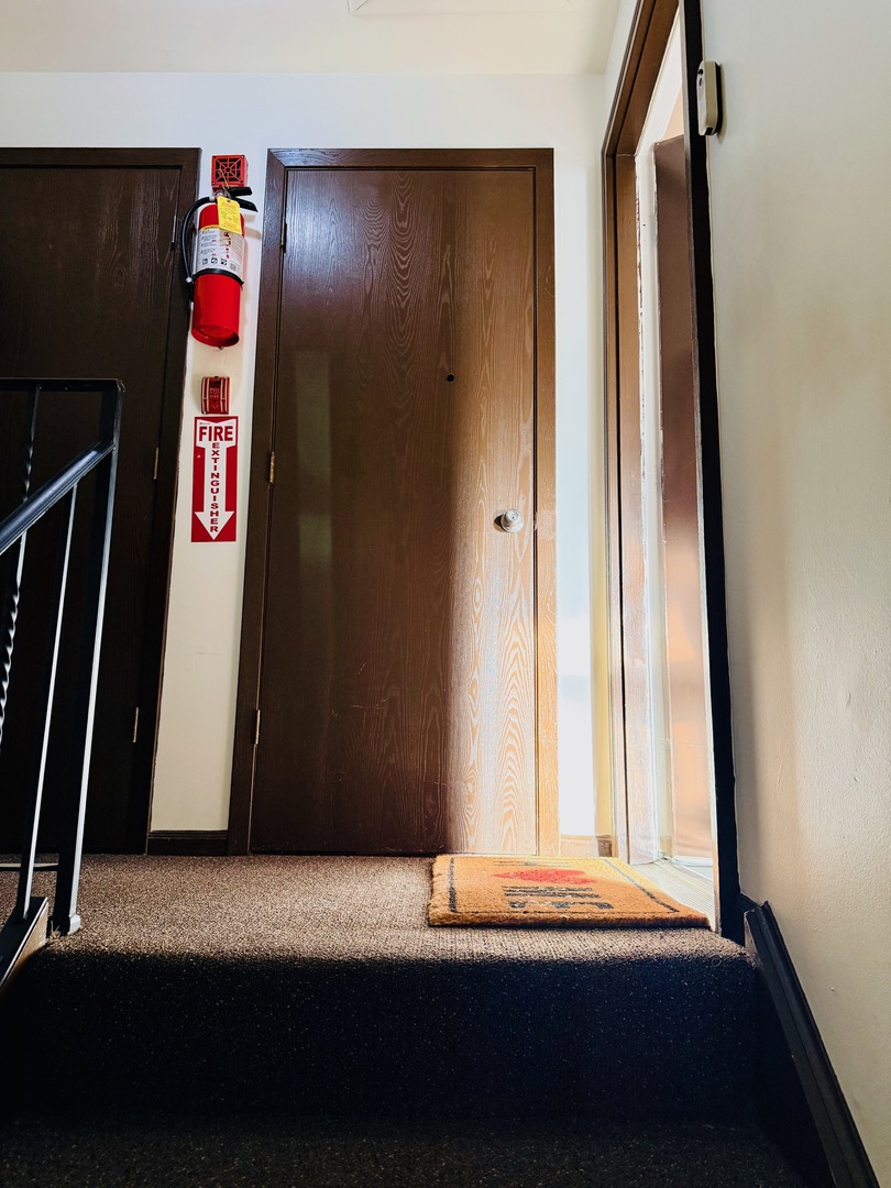 3823 West 123rd Street, Unit 302 Alsip, IL 60803 - Photo 24 of 35 a view of an entryway with wooden floor