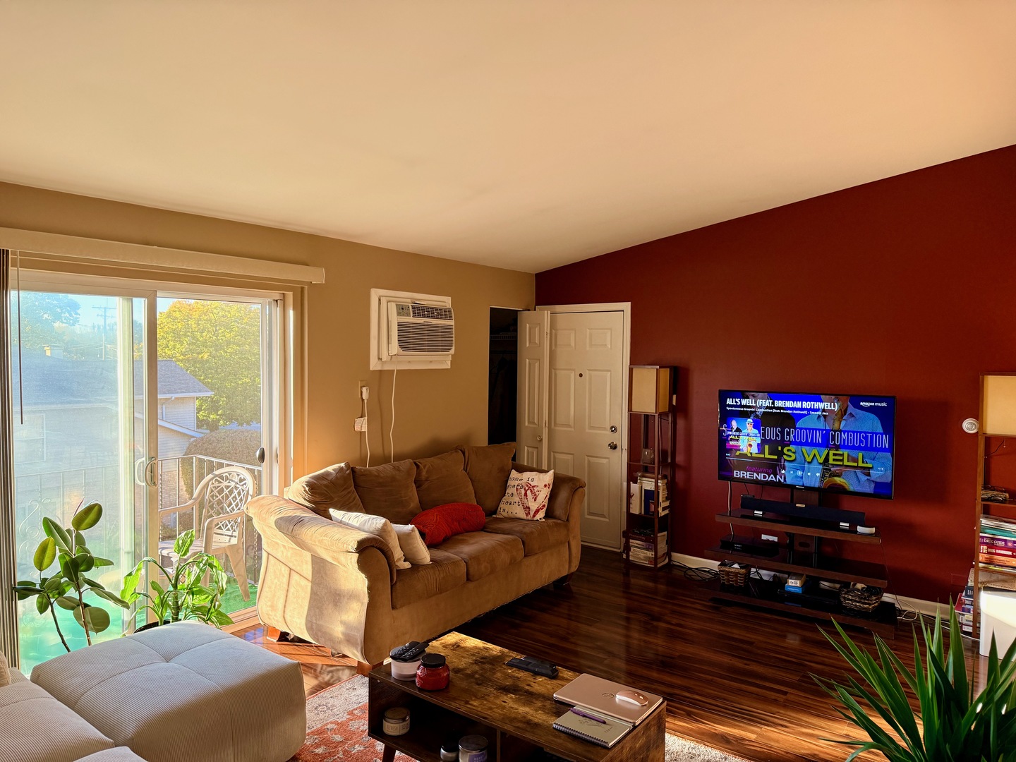 3823 West 123rd Street, Unit 302 Alsip, IL 60803 - Photo 7 of 35 a living room with furniture and a flat screen tv