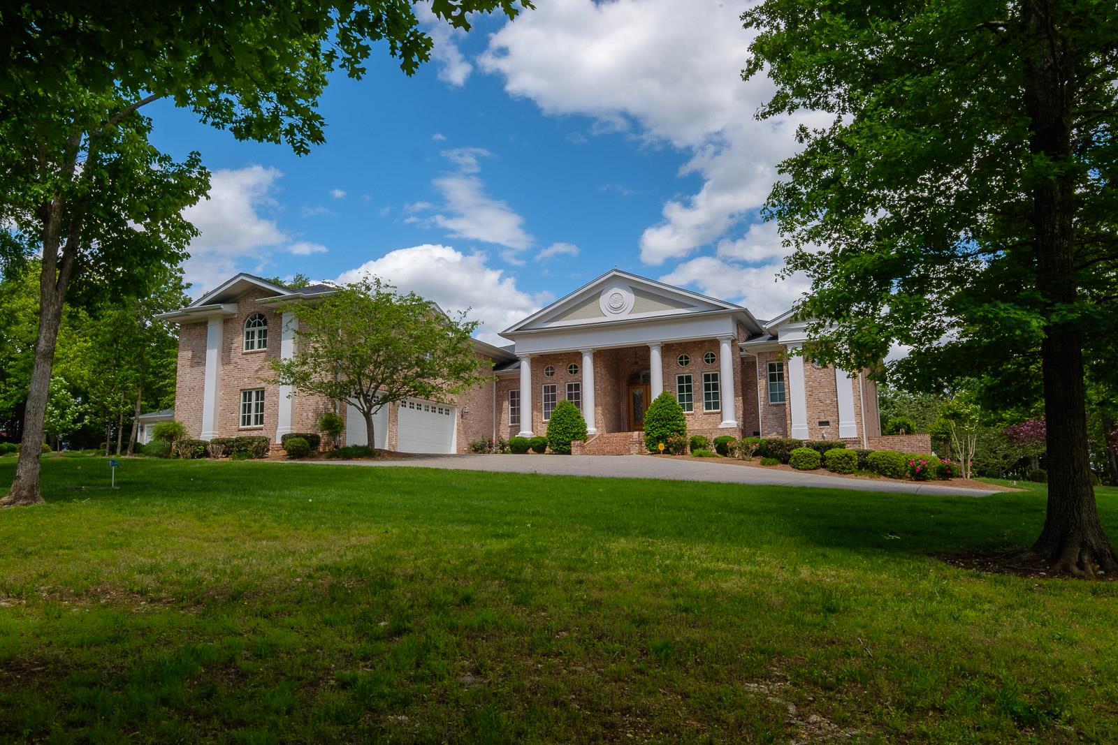 247 Canoe Branch Road Lebanon, TN 37087 - Photo 1 of 30 a front view of a house with a garden