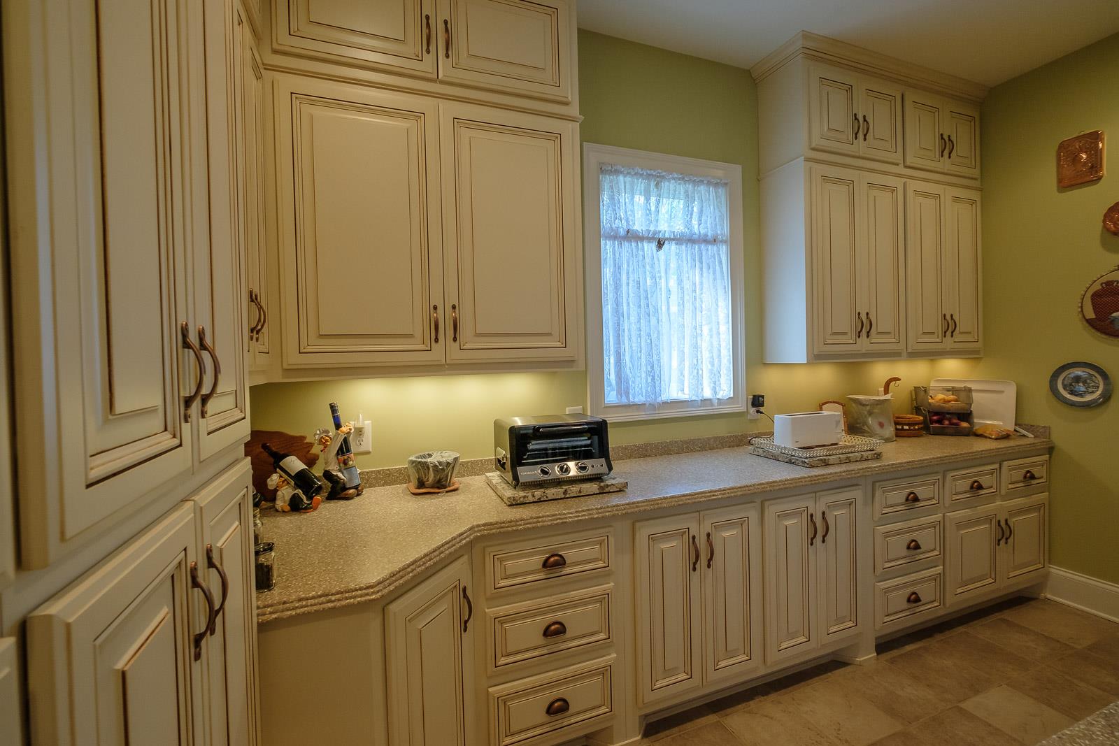 247 Canoe Branch Road Lebanon, TN 37087 - Photo 15 of 30 a kitchen with stainless steel appliances granite countertop a sink a stove and cabinets