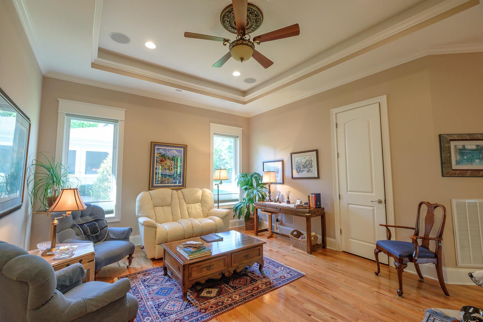 247 Canoe Branch Road Lebanon, TN 37087 - Photo 16 of 30 a living room with furniture a rug and a chandelier