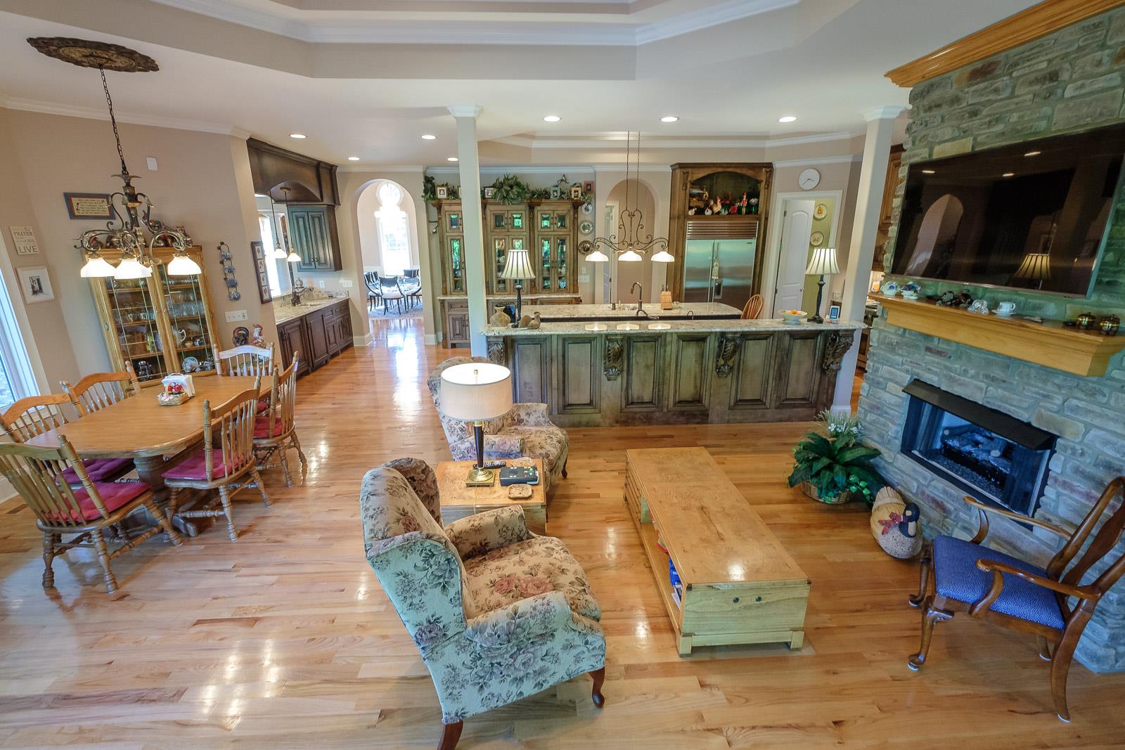247 Canoe Branch Road Lebanon, TN 37087 - Photo 18 of 30 a living room with fireplace furniture and a flat screen tv