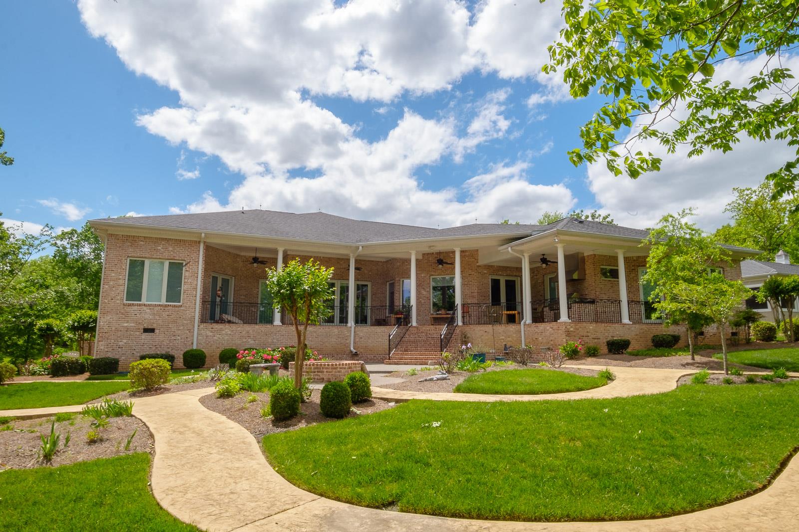 247 Canoe Branch Road Lebanon, TN 37087 - Photo 27 of 30 a view of a house with a backyard porch and sitting area