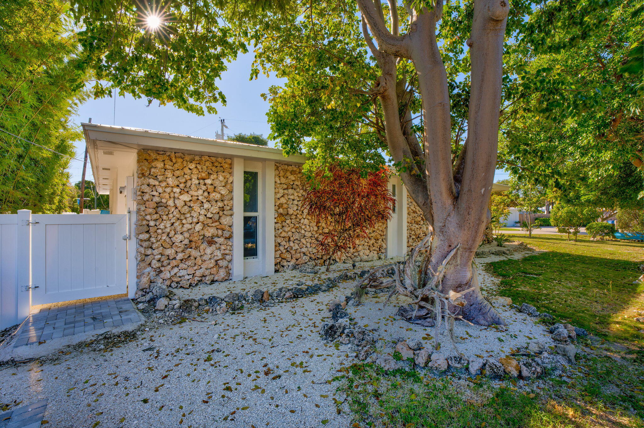 222 2nd Road Key Largo, FL 33037 - Photo 26 of 43 front view of a house with a yard