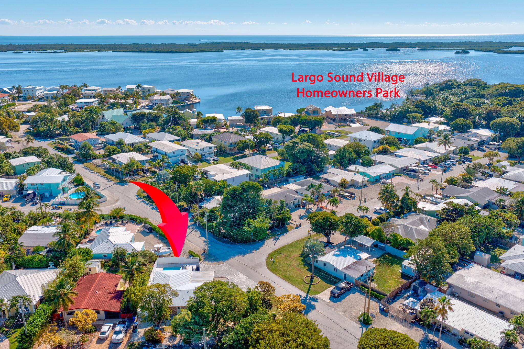 222 2nd Road Key Largo, FL 33037 - Photo 37 of 43 a picture of city and swimming pool