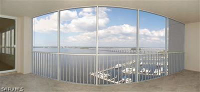 2104 West First Street, Unit 1602 Fort Myers, FL 33901 - Photo 4 of 10 a view of a glass door