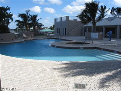2104 West First Street, Unit 1602 Fort Myers, FL 33901 - Photo 7 of 10 a view of a house with a yard
