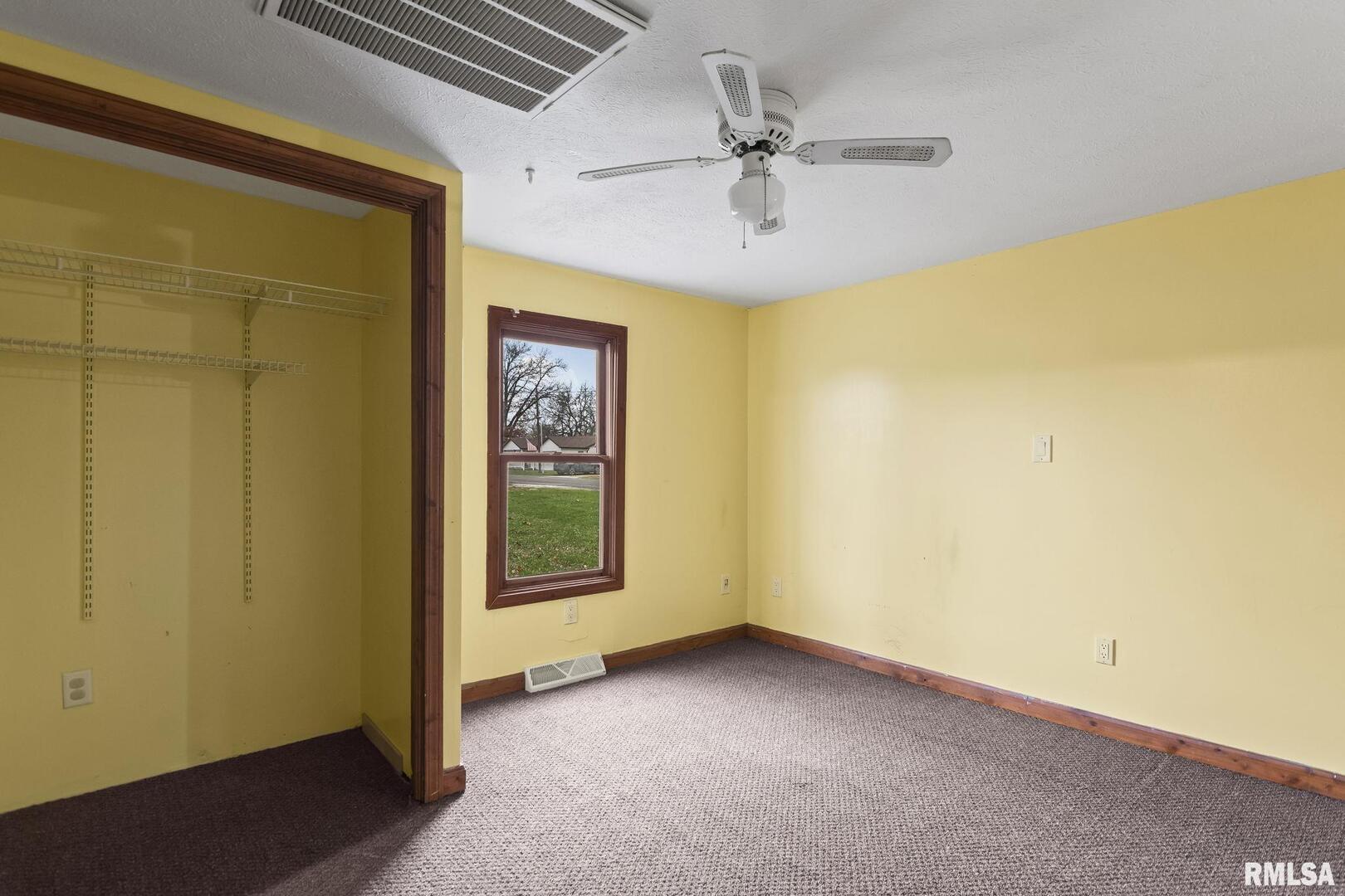 220 East Wilcox Street Springfield, IL 62707 - Photo 16 of 36 a view of an empty room with a window