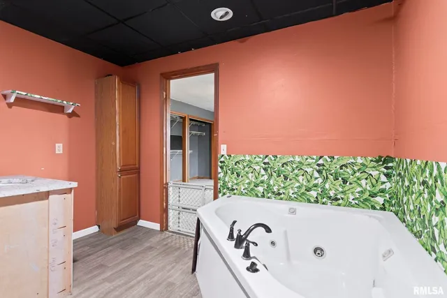 a view of balcony with wooden floor