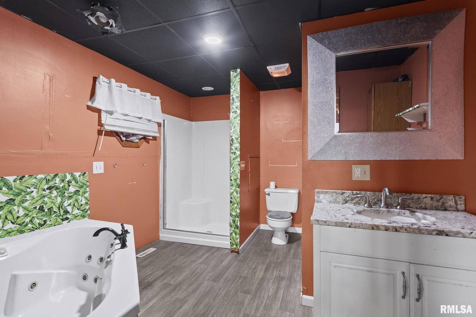 220 East Wilcox Street Springfield, IL 62707 - Photo 22 of 36 a bathroom with a granite countertop sink and a mirror