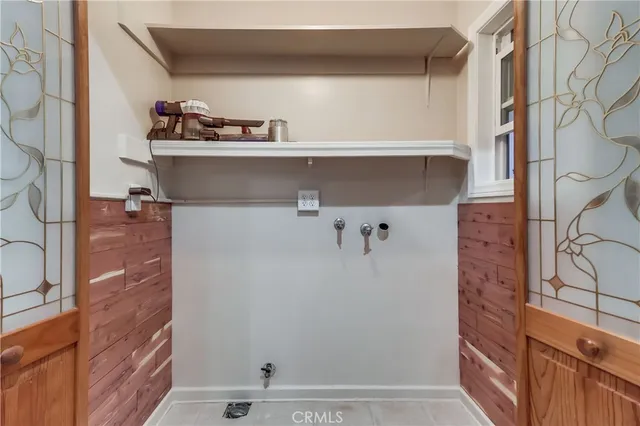 a kitchen with stainless steel appliances granite countertop a sink and a stove
