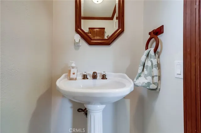 an empty room with closet and wooden floor