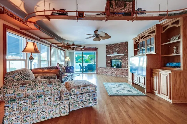a white toilet sitting next to a shower