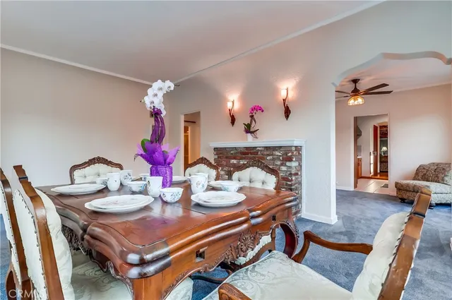 a view of a livingroom with furniture and a dinning area