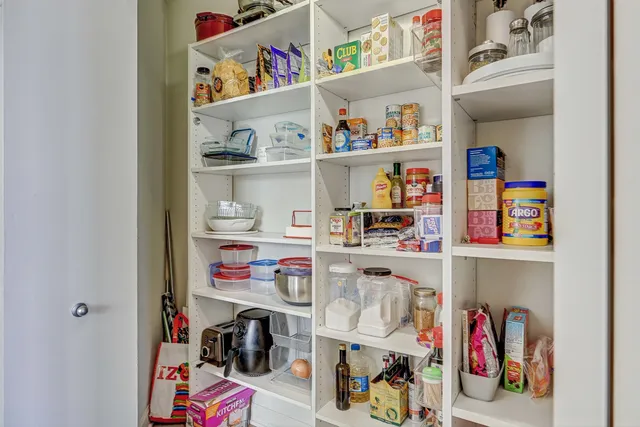 a view of storage and utility room with toys