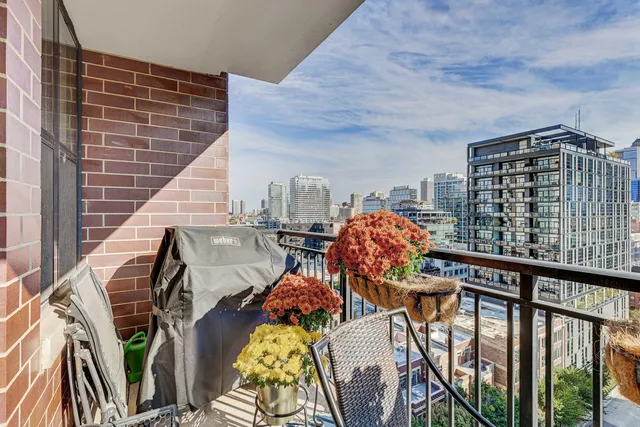 a view of balcony with furniture
