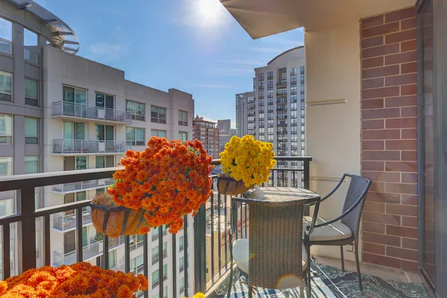 a view of a chairs and table in the patio