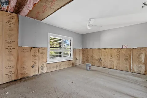 an empty room with windows