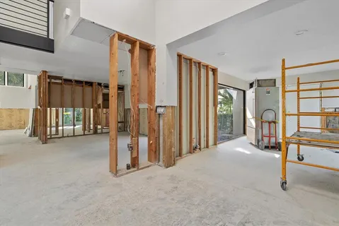 a view of livingroom with furniture and floor to ceiling window