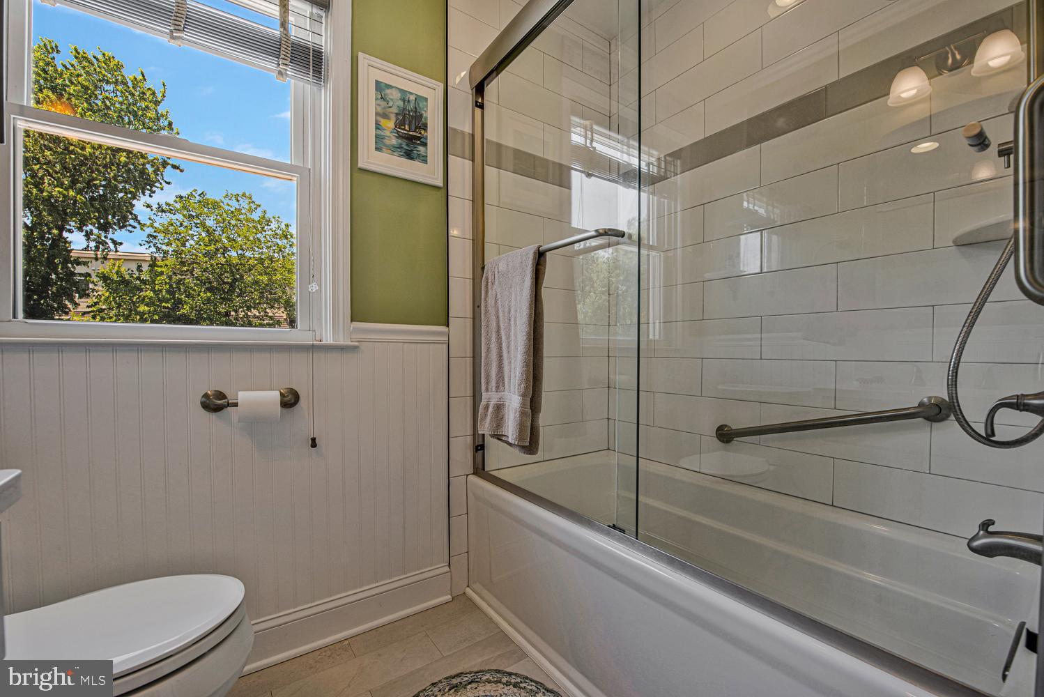 902 Locustvale Road Towson, MD 21204 - Photo 22 of 35 a bathroom with a shower and a toilet