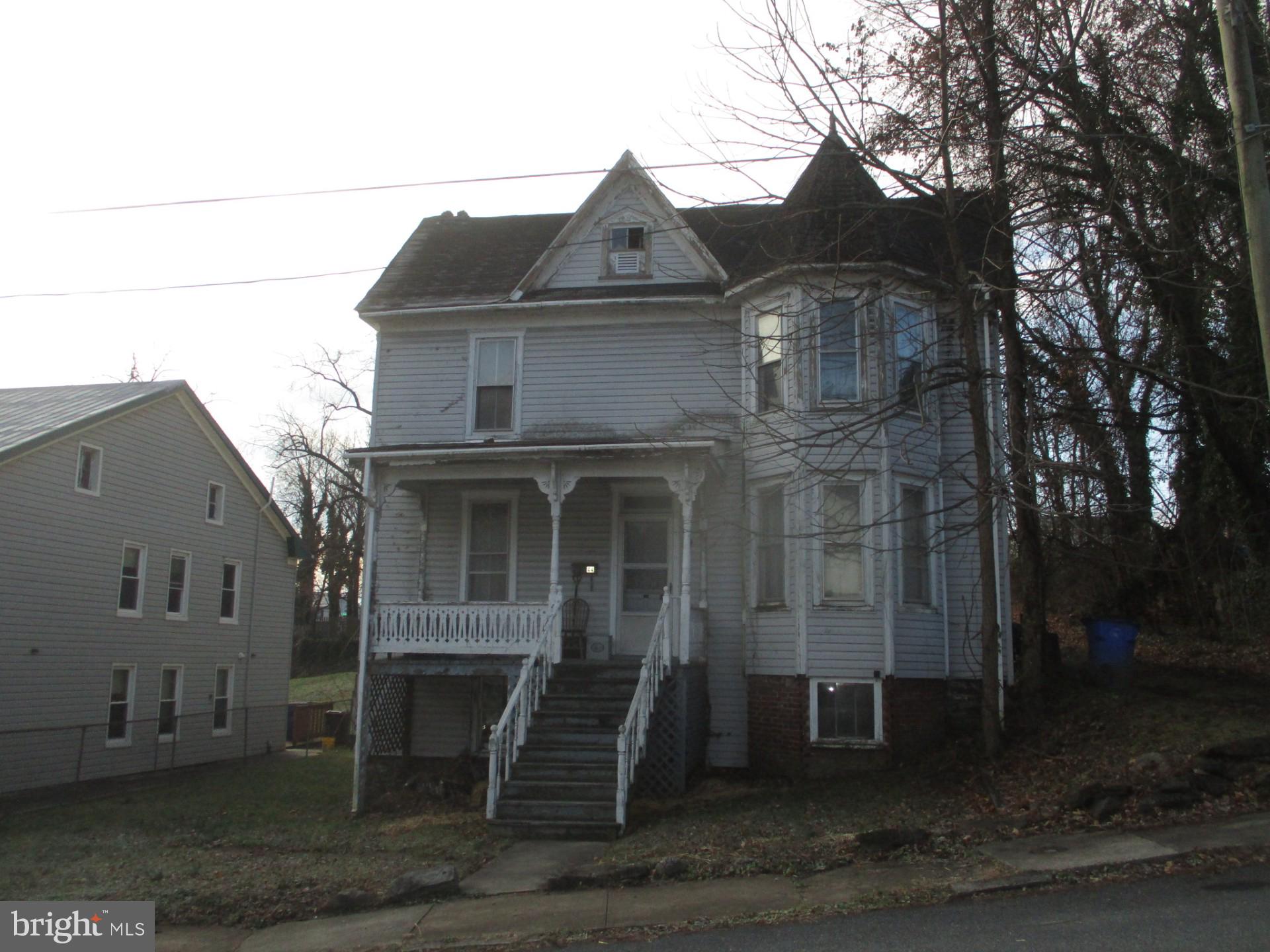 44 East B Street Brunswick, MD 21716 - Photo 1 of 1 a front view of a house with a yard