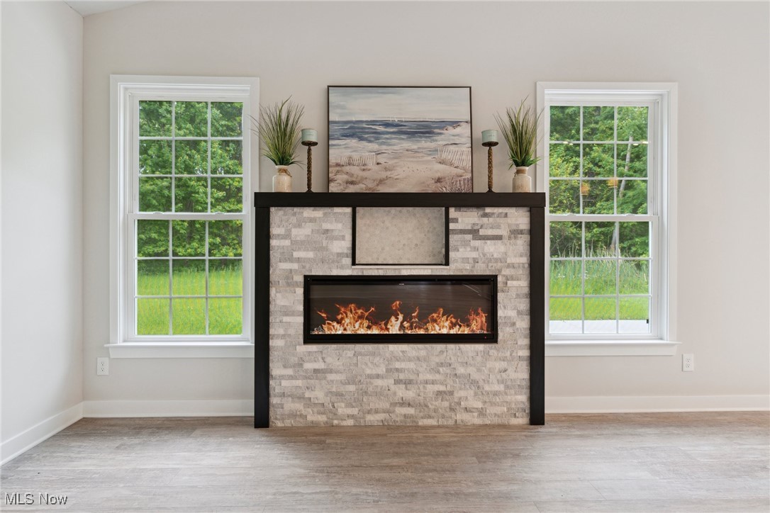 7605 Lake Road East Madison, OH 44057 - Photo 8 of 50 Living room featuring a gorgeous fireplace