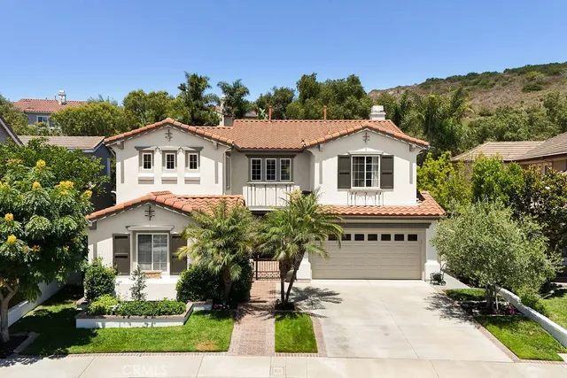 a house with a garden in the background