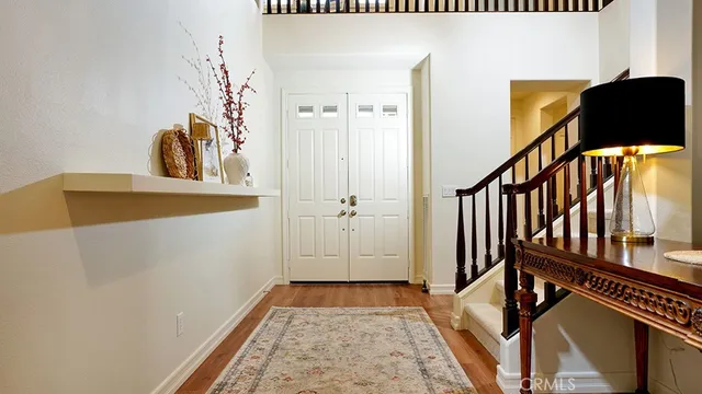 a view of swimming pool with chairs and yard
